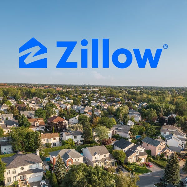 Zillow logo over houses