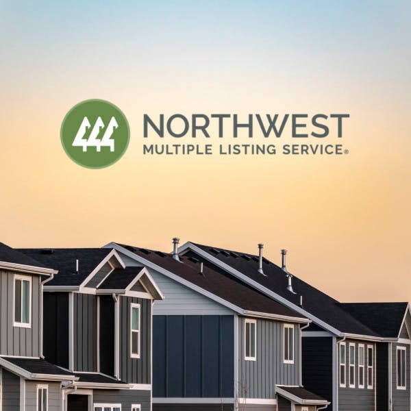 Northwest Multiple Listing Service logo and house rooftops at the golden hour