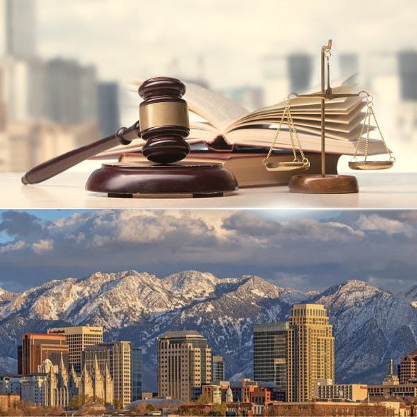 A judge's gavel and the Salt Lake City, Utah, skyline