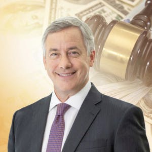 CoStar CEO Andy Florance against a backdrop of a gavel and money
